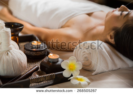 stock-photo-candle-in-the-spa-and-wellness-268505267